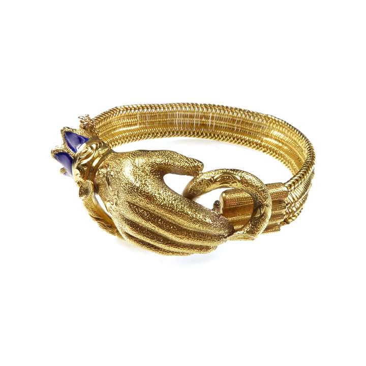 Woven gold bracelet with gold and enamel hand clasp